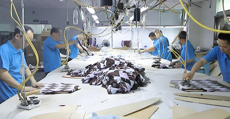 Final garment steaming and quality finishing at sweaters factory